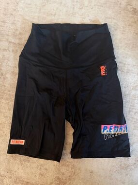 P.E Nation Black High-Rise Bike Shorts with Neon Pink and Orange Logos